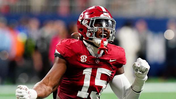 Alabama Crimson Tide linebacker Dallas Turner (15) celebrates after a sack in the second quarter against the Georgia Bulldogs in the SEC Championship at Mercedes-Benz Stadium.